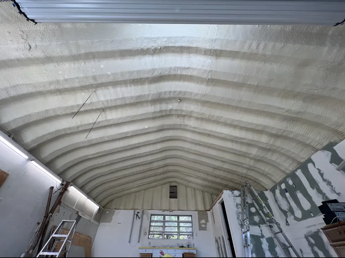Spray polyurethane foam applied to the underside of a metal roof deck in Thousand Palms